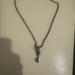 Elegant Silver and Blue Topaz Pendant